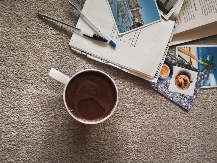 coffee cup and note book